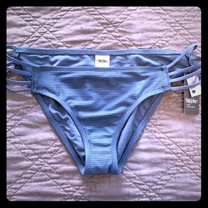 Strappy hipster cut swim bottoms